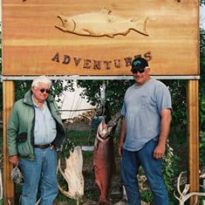 two nushagak river fishermen with the salmon they caught while fishing on alaska's nushagak river